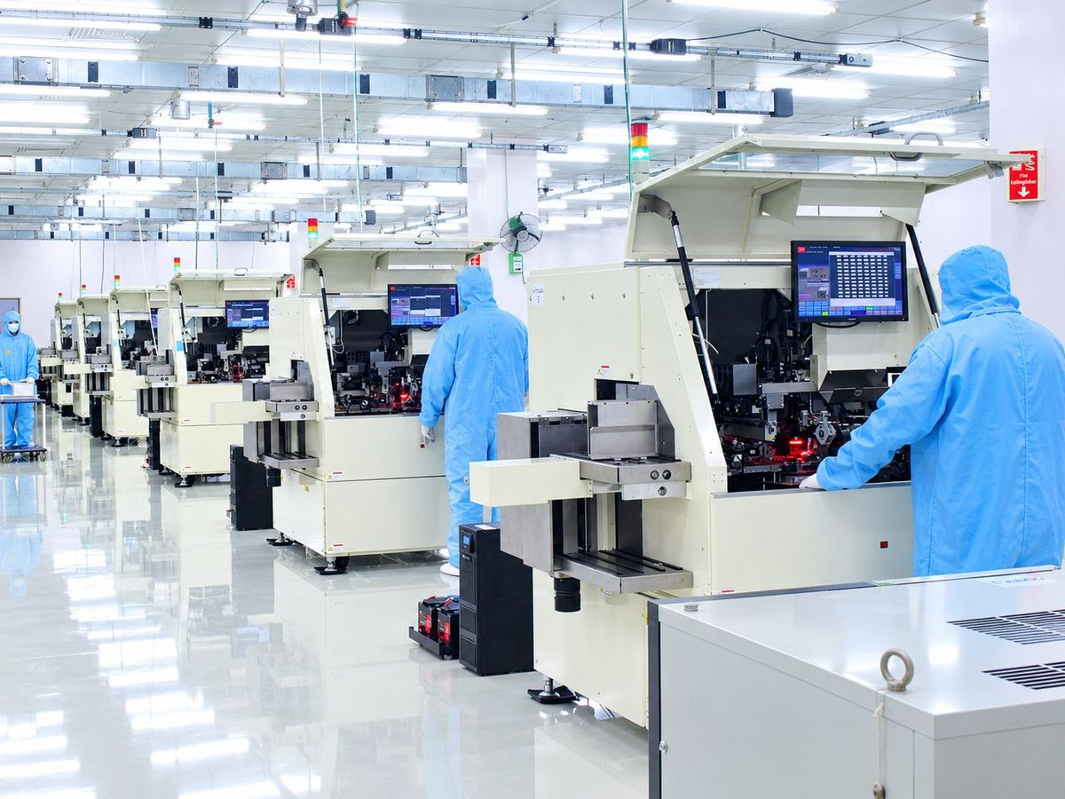 Polymatech operators at the LED packaging line, Oragadam